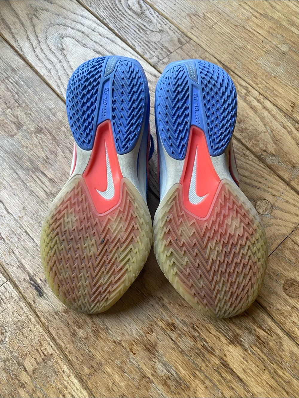 Nike Blue Low-Top Trainers with White and Red Swoosh